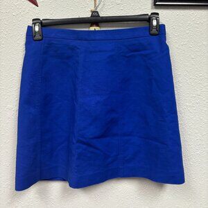 Elevate your workwear with the Vince Camuto Short Office Blue Skirt, a perfect b